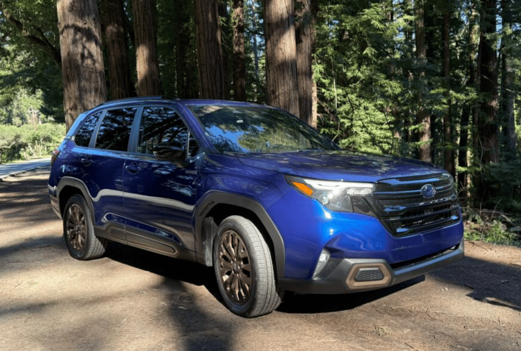 The Subaru Forester Hybrid Parked In Front Of California Redwoods